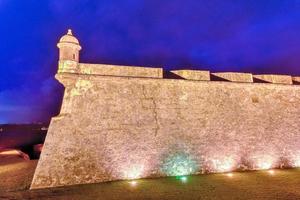 Castillo San Felipe del Morro also known as Fort San Felipe del Morro or Morro Castle at dusk. It is a 16th-century citadel located in San Juan, Puerto Rico. photo