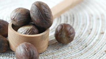 walnut on a plate on table , close up video