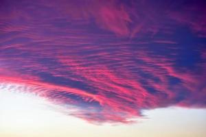 Colorful clouds at sunset in the evening. photo