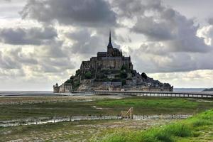 Beautiful Mont Saint-Michel cathedral on the island, Normandy, Northern France, Europe. photo