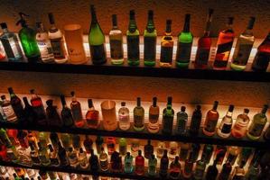 Buenos Aires, Argentina - May 22, 2007 -  Several types of bottled alcohol and liquor are displayed on some shelves in a pub. photo