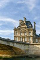 The Pont Royal is a bridge crossing the river Seine in Paris, France. It is the third oldest bridge in Paris, after the Pont Neuf and the Pont Marie. photo