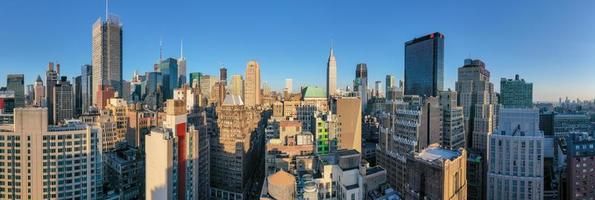 New York City - May 8, 2019 -  Panoramic view of Midtown Manhattan and the New Yorker Hotel in New York City during the day. photo