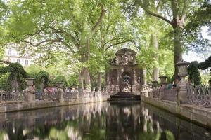 The Medici Fountain, monumental fountain in the Jardin du Luxembourg in the 6th arrondissement in Paris, France. photo