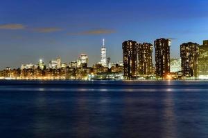 New York City - Apr 7, 2021 -  View of Midtown Manhattan at sunset from Long Island City, Queens, New York City. photo