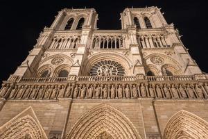 Notre-Dame de Paris, is a French Gothic medieval Catholic cathedral on the Ile de la Cite in the fourth arrondissement of Paris, France. photo