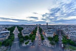 View of the Paris city skyline into the distance at dusk. photo