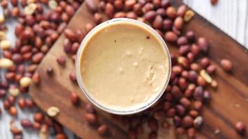 Top view of peanut butter in a container video