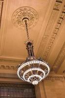 New York City - December 28, 2015 -  Beaux-Arts style waiting hall decorated with chandeliers in Grand Central Terminal in New York City. photo