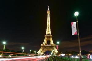 The Eiffel Tower, a wrought iron lattice tower on the Champ de Mars in Paris, France, 2022 photo