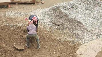 High angle view of men hand picking popcorn and using tv remote video