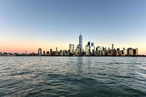 New York skyline as viewed across the Hudson River in New Jersey at sunset. photo