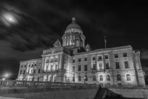 The Rhode Island State House, the capitol of the U.S. state of Rhode Island at night in black and white. photo