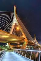 Boston Leonard P. Zakim Bunker Hill Memorial Bridge at night in Bunker Hill Massachusetts, USA. photo