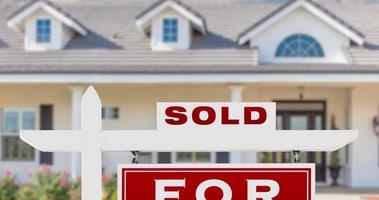 Real estate sign for sale in front of a house video