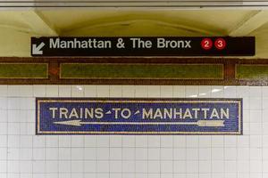 Brooklyn, New York - January 10, 2016 -  Eastern Parkway Brooklyn Museum Subway Stop with arrow sign in Brooklyn, New York in the New York City subway system. photo