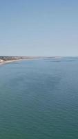 Aerial Footage of British Sandy Beach and Ocean. Vertical and Portrait Style 4k Footage of Bournemouth Beach with Drone's Camera During Sunset video