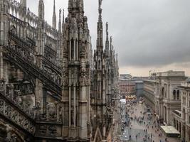 Milan Cathedral, Duomo di Milano, one of the largest churches in the world, on Piazza Duomo square in the Milan city center in Italy. photo