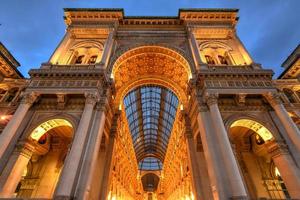 Milan Vittorio Emanuele II Gallery in Milan, Italy. It is Italy's oldest active shopping mall and a major landmark of Milan, Italy. photo