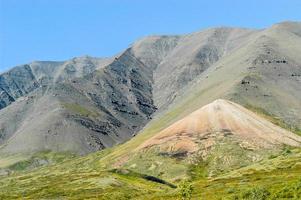 View of a mountain range in Denali National Park, Alaska on a bright summer day photo