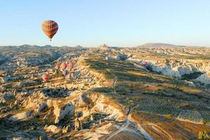 Hot air balloons over Cappadocia, Central Anatolia, Turkey photo