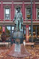 Vancouver, Canada - Sept 30, 2018 -  Bronze statue of Gassy Jack, Jack Deighton, the man who opened the first saloon in the Gastown district, Vancouver in to 1867. photo