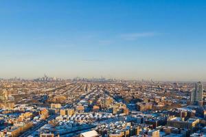 Aerial view of a snow covered Coney Island Beach during the winter at sunrise in Brooklyn, New York photo