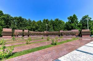 Tashkent, Uzbekistan - July 8, 2019 -  Monument of Courage or Earthquake Memorial complex dedicated to rectification of the consequences of a devastating Tashkent earthquake in 1966. photo