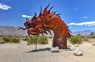 Borrego Spring, CA - July 12, 2020 -  Outdoor metal sculpture of a mythical serpent, close to Anza-Borrego Desert State Park. photo