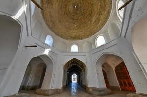 Walkways and streets through the old city of Bukhara in Uzbekistan that keep the air cool even in the hottest of summer days. photo