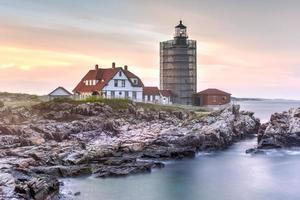 Portland Head Lighthouse in Cape Elizabeth, Maine. It is a historic lighthouse in Cape Elizabeth, Maine. Completed in 1791, it is the oldest lighthouse in the state of Maine. photo