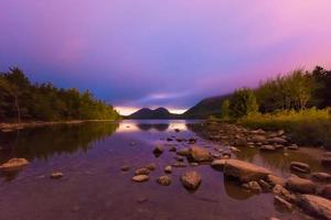 The Bubbles and Jordan Pond at night in Acadia National Park, Maine, USA. photo