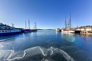 A sailboat in the harbor Pipervika in the center of Oslo, capital of Norway, Europe. photo