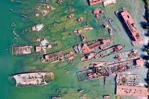 An aerial view from above of abandoned ships at Arthur Kill Boat Graveyard in Staten Island, New York. photo