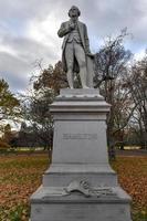 Alexander Hamilton statue in Central Park, New York City. It is carved from solid granite by Carl H. Conrads, was donated to Central Park in 1880 by one of Alexander Hamiltons sons, John C. Hamilton. photo