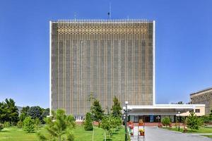 Soviet architecture - tall golden government office building in Samarkand, Uzbekistan, 2022 photo