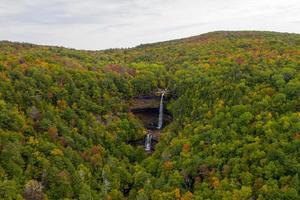 Kaaterskill Falls and Fall Foliage in The Catskill Mountains in upstate New York. photo