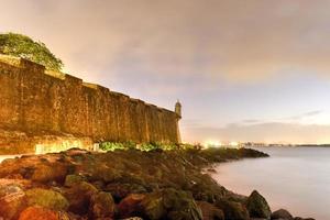 Castillo San Felipe del Morro also known as Fort San Felipe del Morro or Morro Castle at dusk. It is a 16th-century citadel located in San Juan, Puerto Rico. photo