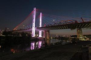 New and old Kosciuszko bridges joining Brooklyn and Queens in New York City across Newtown Creek. The new bridge is a cable-stayed bridge while the old bridge from 1939 is truss bridge. photo