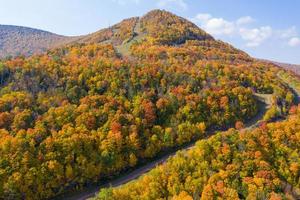 Colorful Hunter Ski Mountain in upstate New York during peak fall foliage. photo