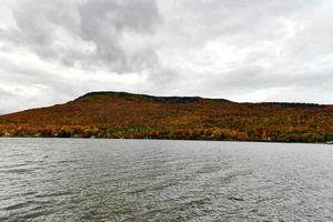 Overlooking of Lake Elmore State Part With Beautiful Autumn Foliage and Water reflections at Elmore, Vermont, USA photo