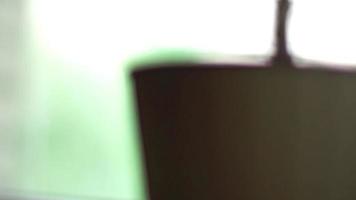 white mug with tea on a table in the Cafe video