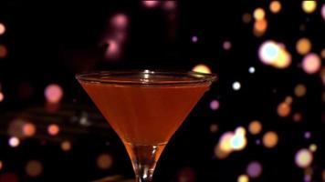 close up of a mouthwatering alcoholic cocktail in a glass video