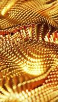geanimeerd Golf in beweging structuur van goud kubussen. verticaal lusvormige video