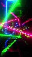 Multicolored lasers moving in a rectangular tunnel. Vertical looped video