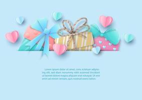 Hearts in sweet colors with Valentine's gift box, example texts in paper cut style in light blue paper pattern background. Valentine's greeting card in paper cut style and vector design.