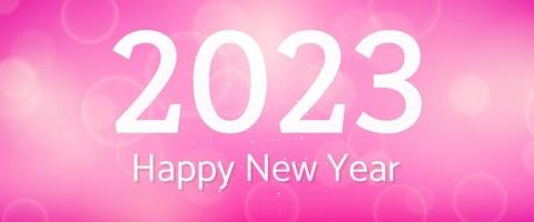 Happy new year 2023 incription on blurred background vector