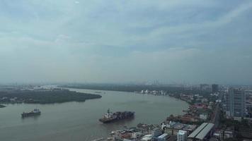 The landscape of the Chao Phraya River Estuary and the landscape of Samut Prakan City are the gateways to the seas of Thailand's merchant ships. video