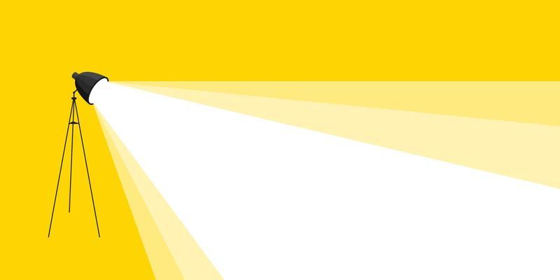 Spotlight shines down banner. Light from the lamp. Vector image