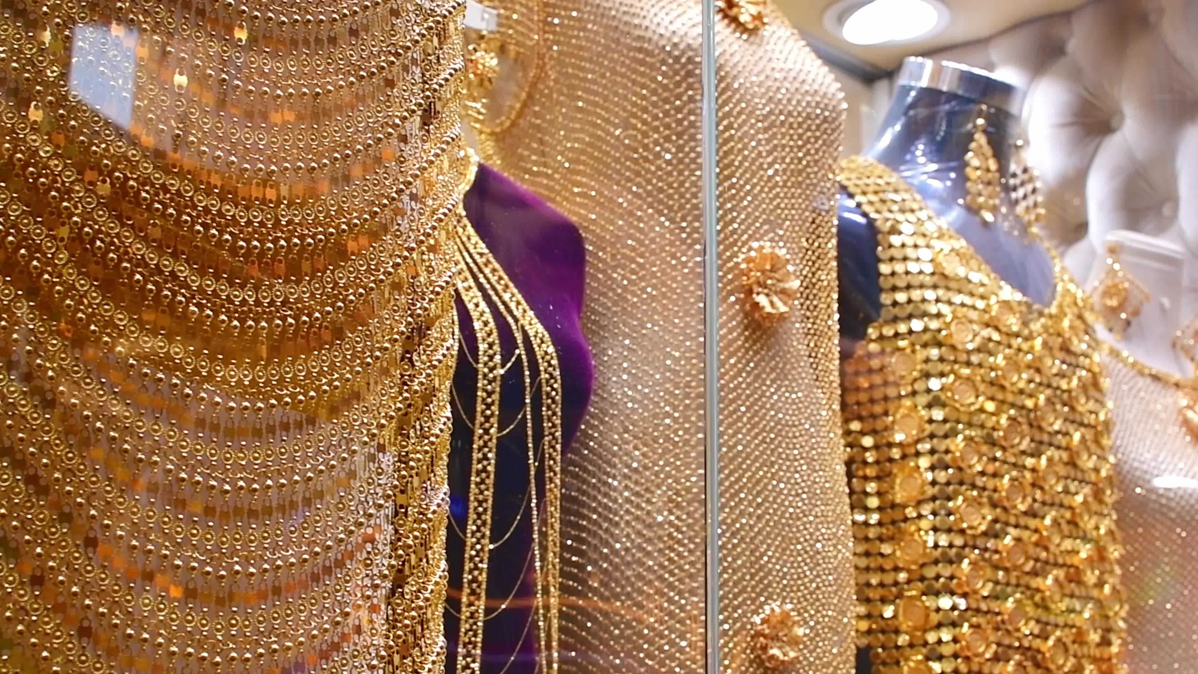 Dubai, UAE , 2022 most expensive shop items luxury golden dresses